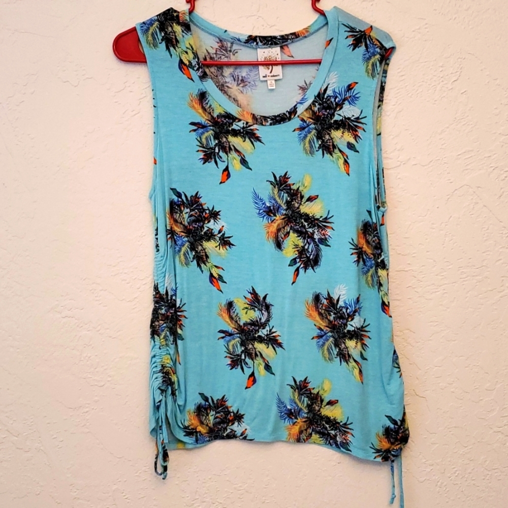 Tropical sleeveless shirt with side ties